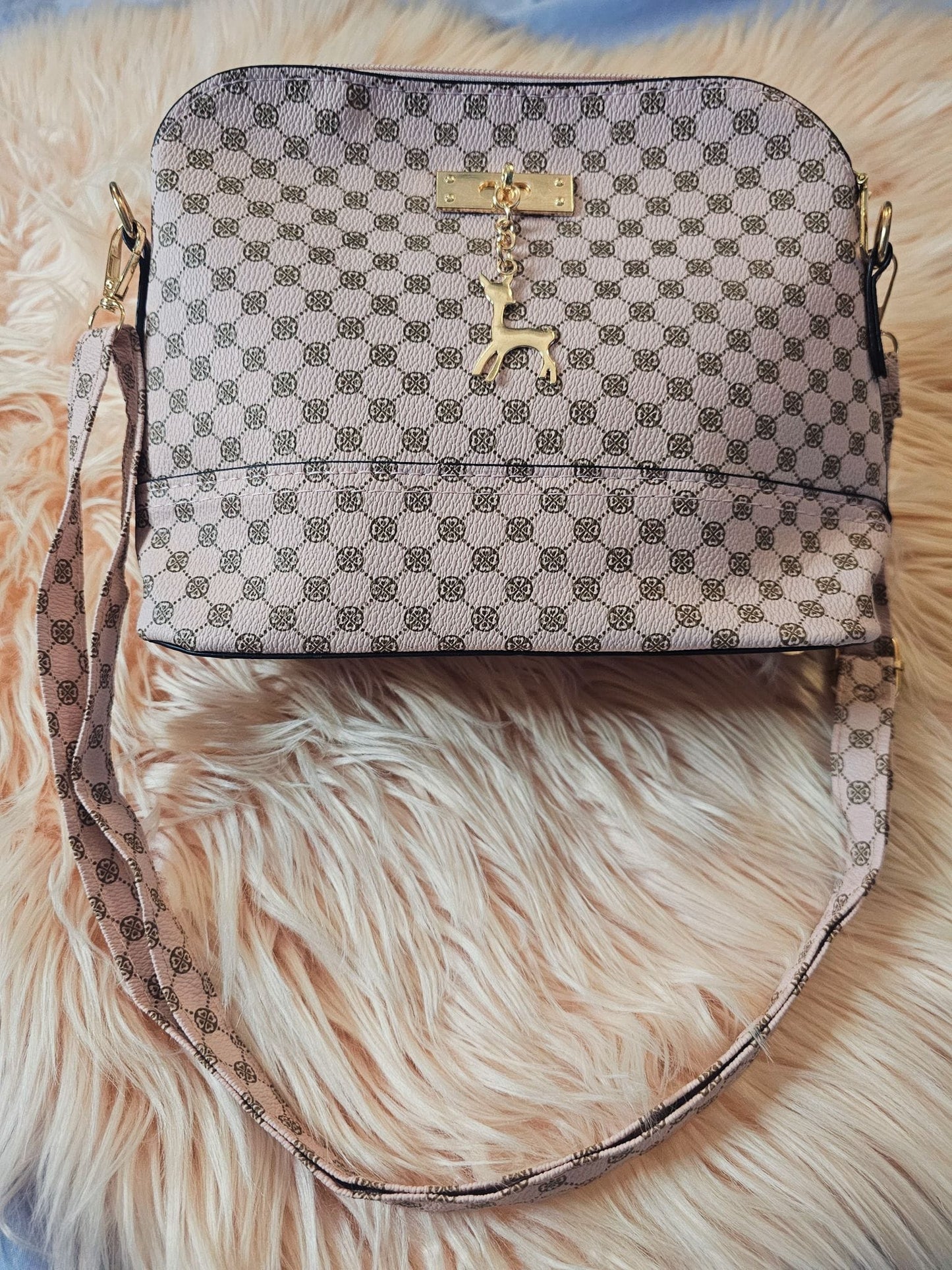 BOLSO BANDOLERA ESTAMPADO ROSA